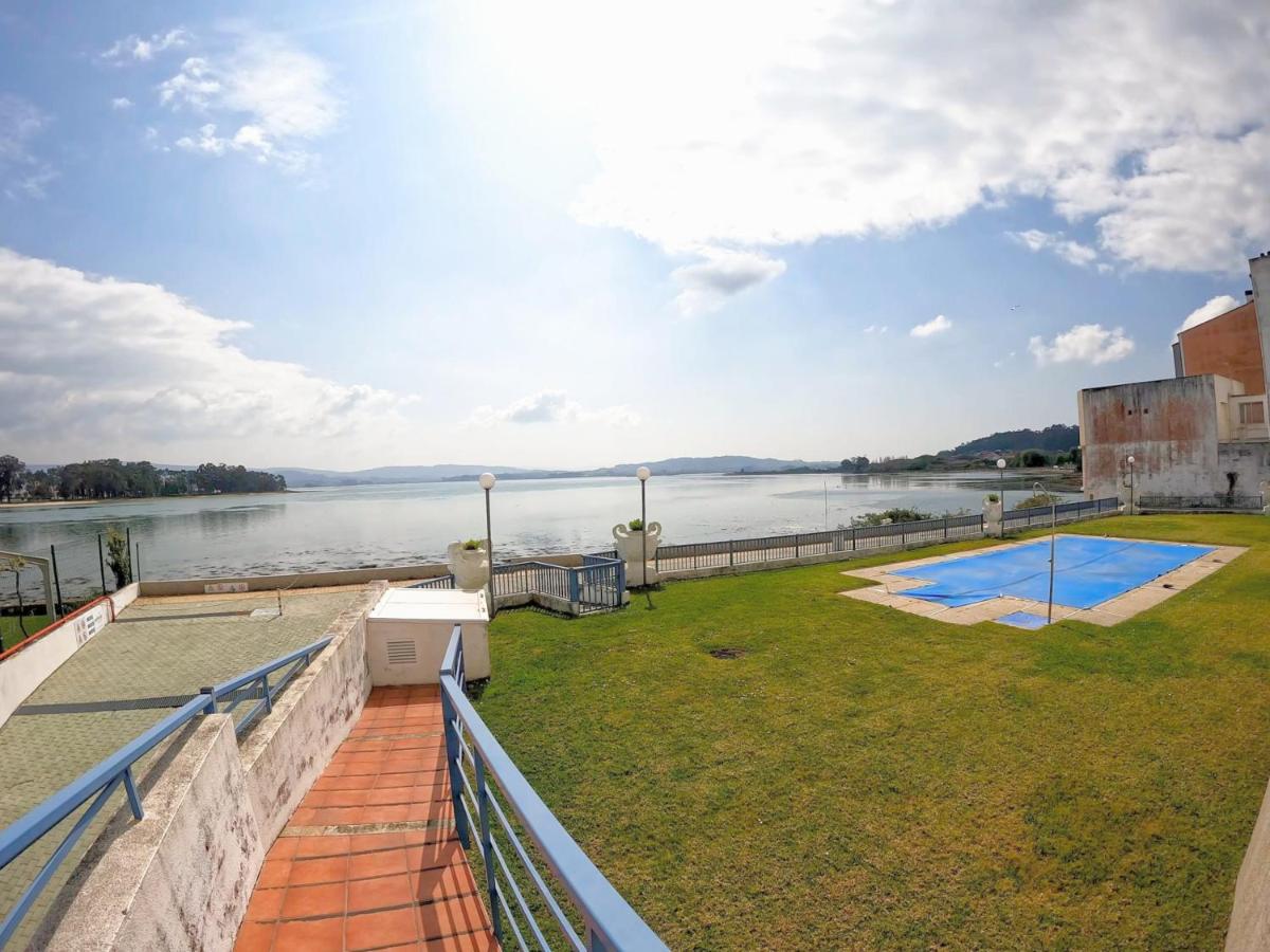 Precioso apartamento con piscina y jardín frente a la Toja - Chambres d'hôtes O Grove