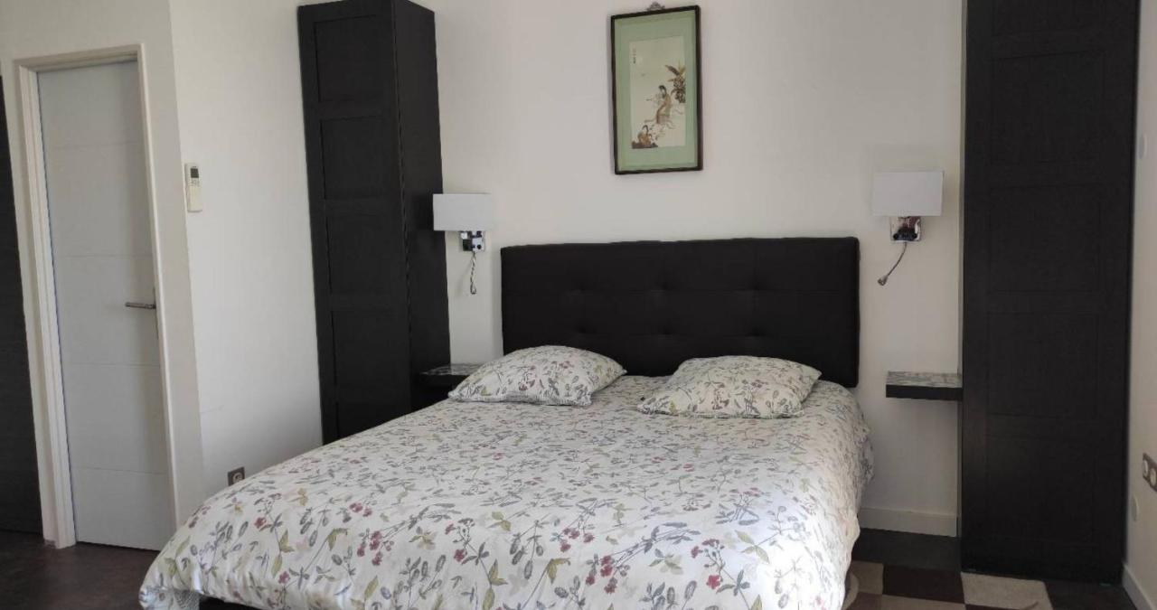 Dreibettzimmer mit Gartenblick
