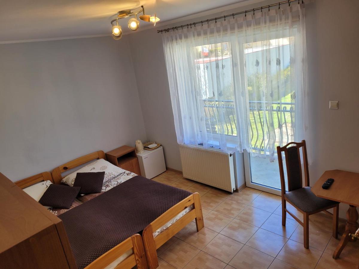 Standard Zimmer mit 2 Einzelbetten und Sofa