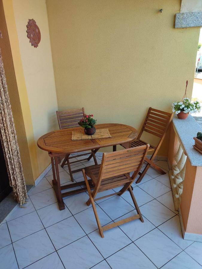 Appartamento a La Caletta - Chambres d’hôtes