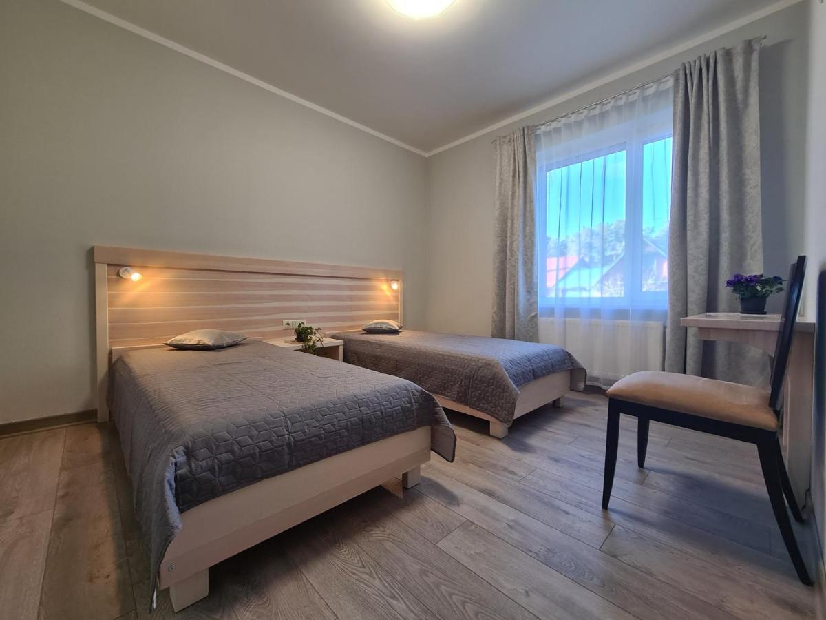 Camera Doppia con Letti Singoli