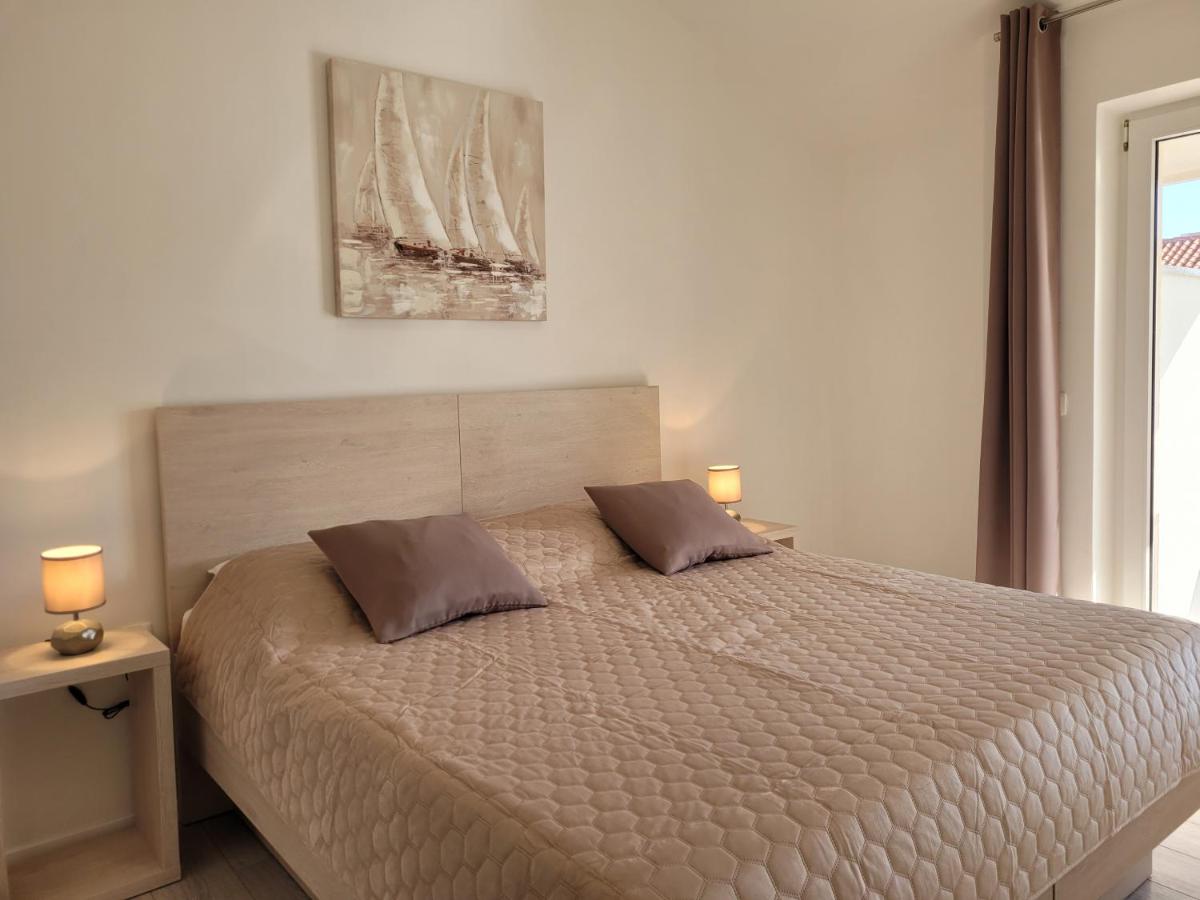 Apartmani Tamarut - B&B Novalja