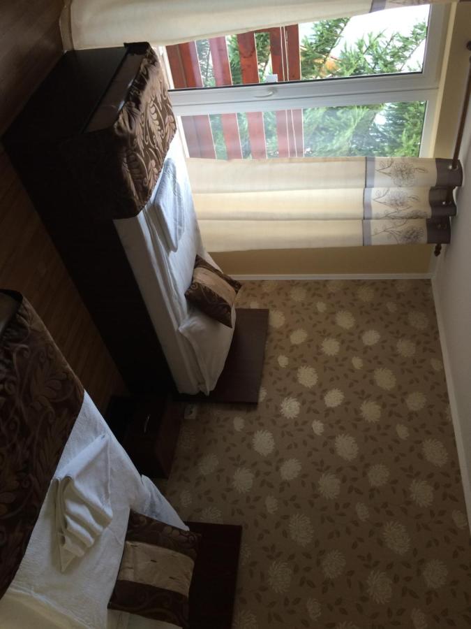 Tweepersoonskamer met 2 Aparte Bedden