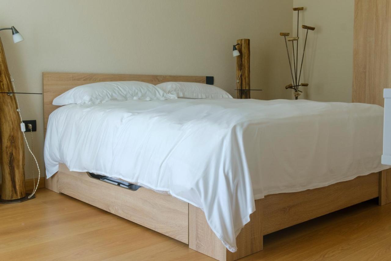 Dreibettzimmer mit Gartenblick