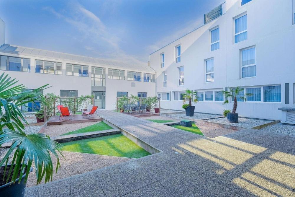 Studio meublé avec parking idéalement placé - Ferienwohnung