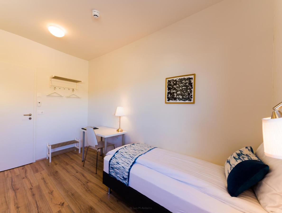 Kleine Tweepersoonskamer met 2 Aparte Bedden