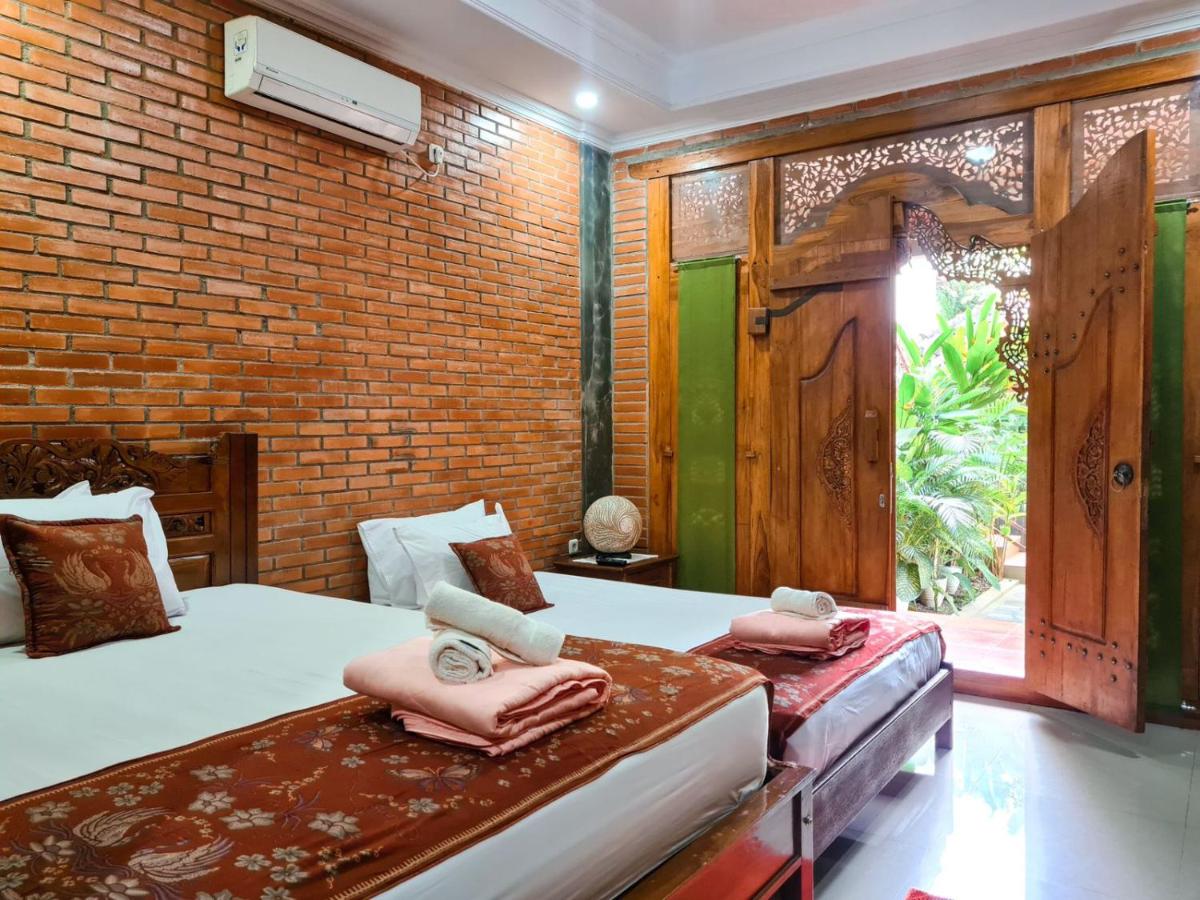 B&B Yogyakarta - Ndalem Suryo Saptono Guest House - Bed and Breakfast Yogyakarta