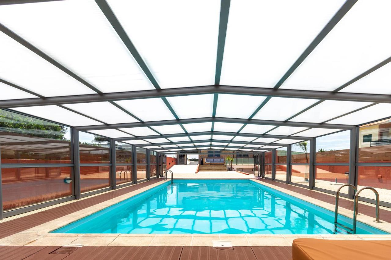 O CANTINHO ENTRE A RIA E O MAR - with hot water pool all year round - B&B Torreira