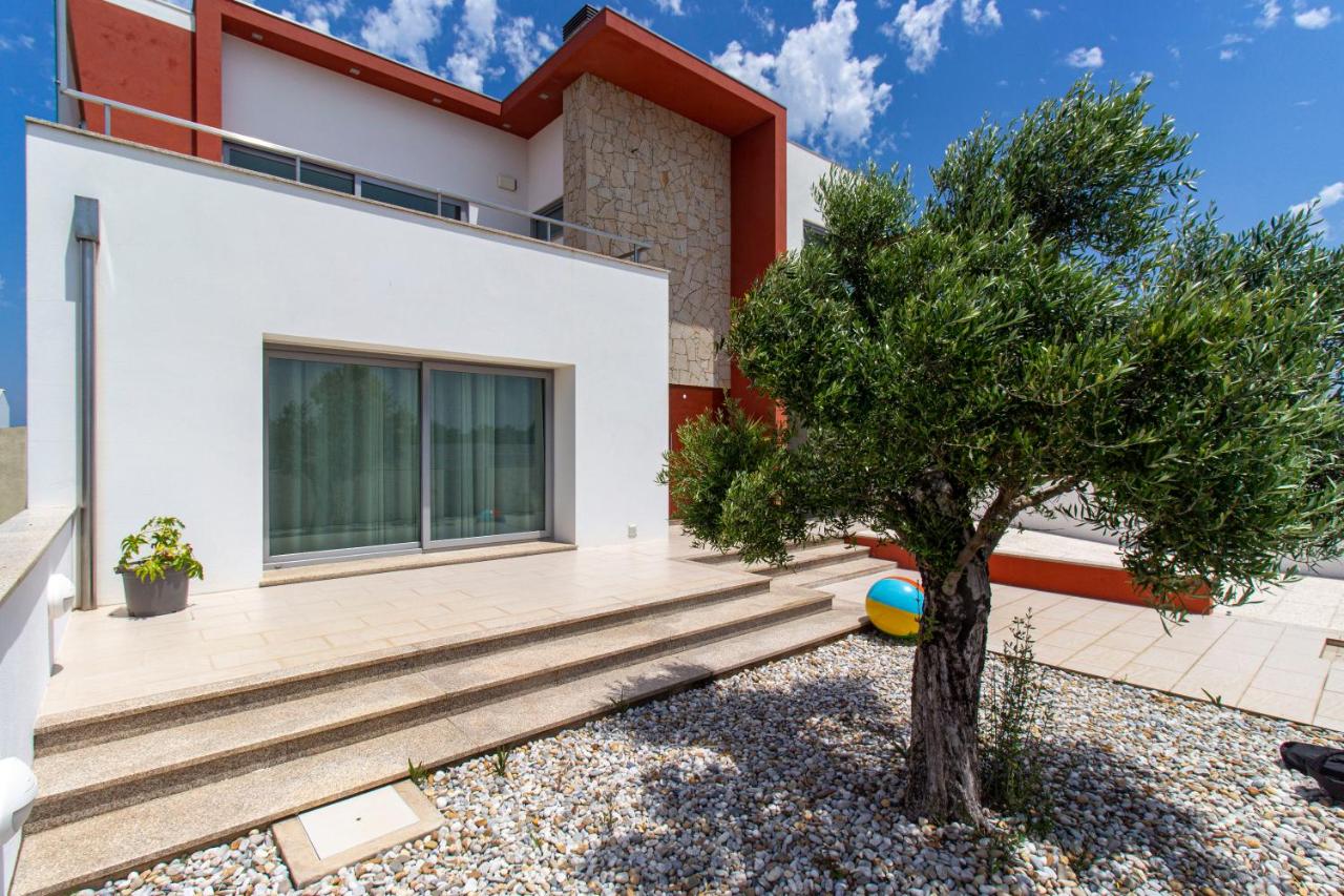 O CANTINHO ENTRE A RIA E O MAR - with hot water pool all year round - B&B Torreira