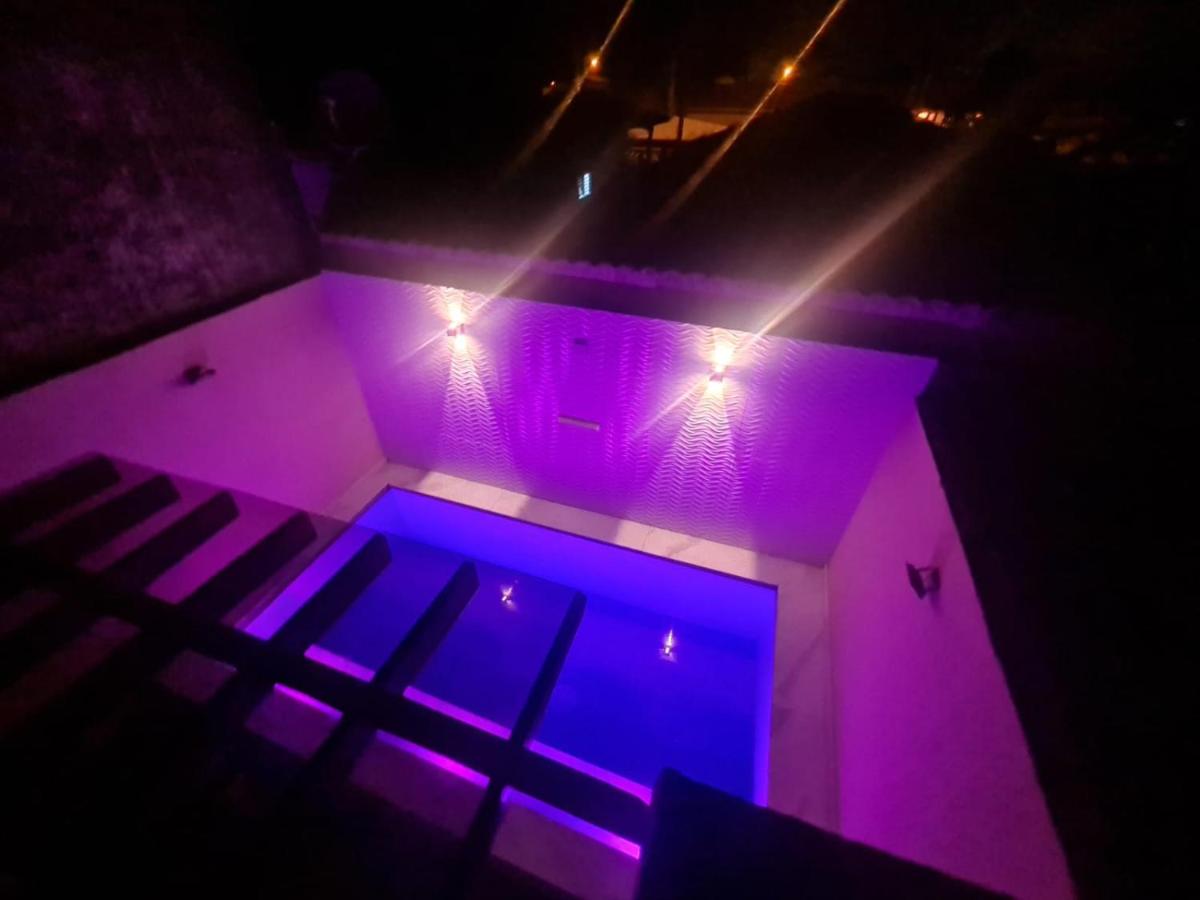 A Casa Linda Com Piscina Aquecida churrasqueira wifi pertinho da praia em Itanhaém - B&B Itanhaém
