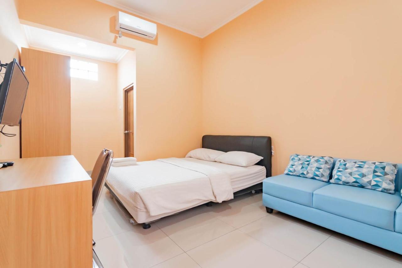 B&B Bandung - Shofy Guest House Mitra RedDoorz - Bed and Breakfast Bandung