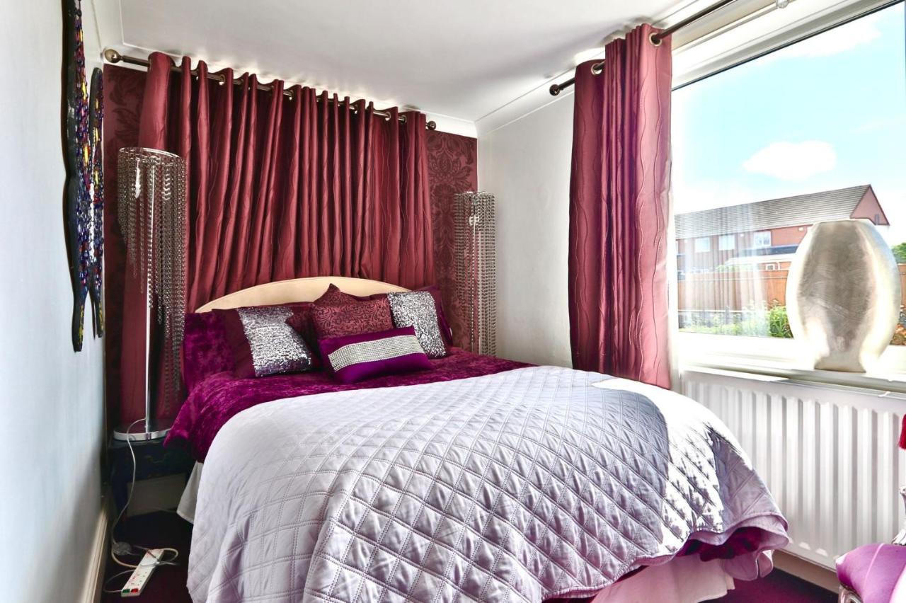 Dreibettzimmer mit Gartenblick
