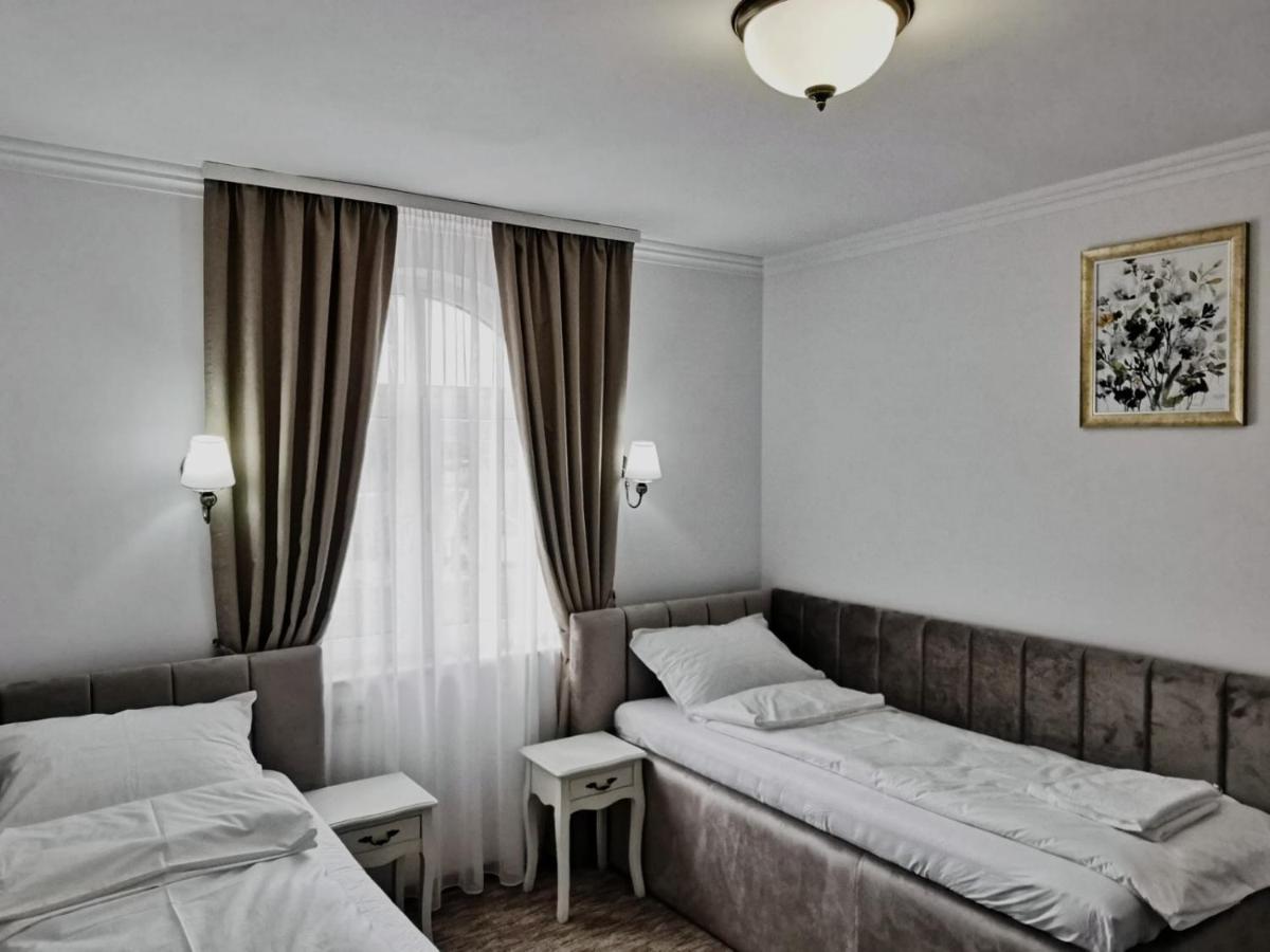 Tweepersoonskamer met 2 Aparte Bedden