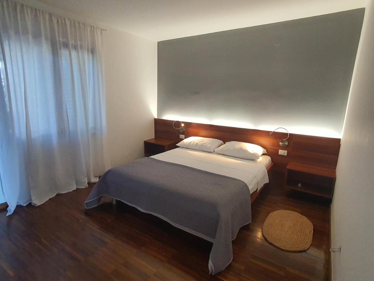 Deluxe Two-Bedroom Apartment with Terrace and Sea View