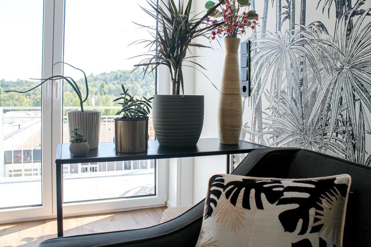 Tropical Apartment - für Freunde & Familien, stadtnah, Parkplatz, E-Ladestation, Gitterbox für Fahrräder, Fitnessstudio, digitale Gästemappe mit Restaurant- und Unternehmenstipps - Chambres d'hôtes Coblence