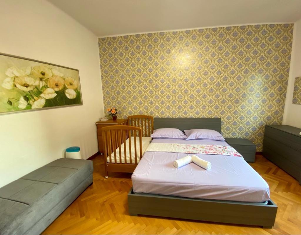 Camera Matrimoniale con Letto Supplementare