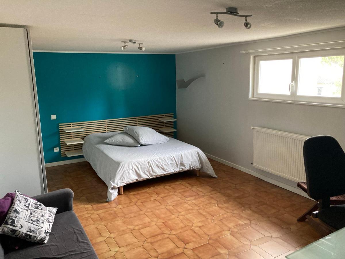 Appartement en rez-de-chaussée de maison - Ferienwohnung