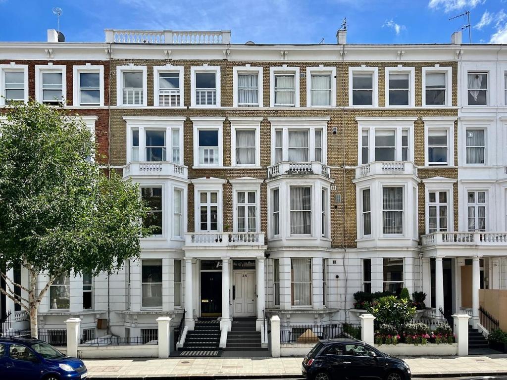 Imperial Earls Court Apartments - Chambres d’hôtes