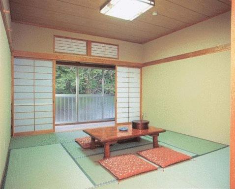 Chambre Quadruple avec Salle de Bains Commune