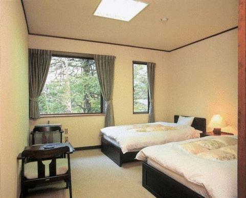 Chambre Lits Jumeaux Standard avec Salle de Bains Commune