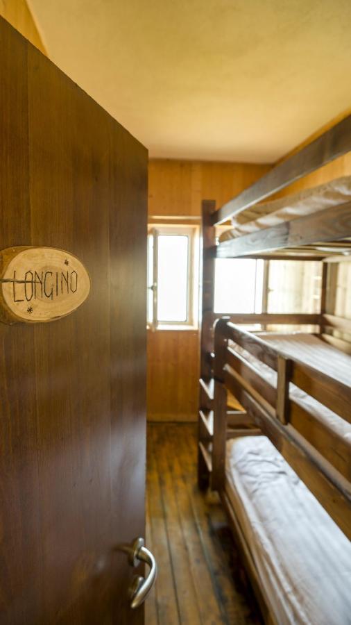 Dreibettzimmer mit Bergblick