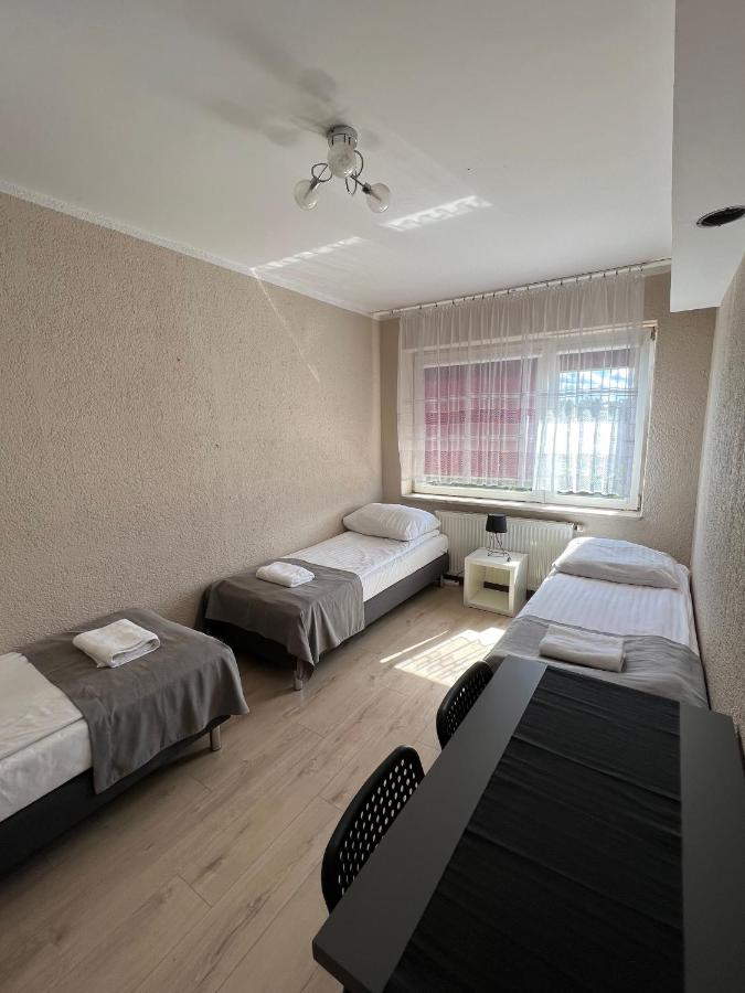 Dreibettzimmer mit Gemeinschaftsbad