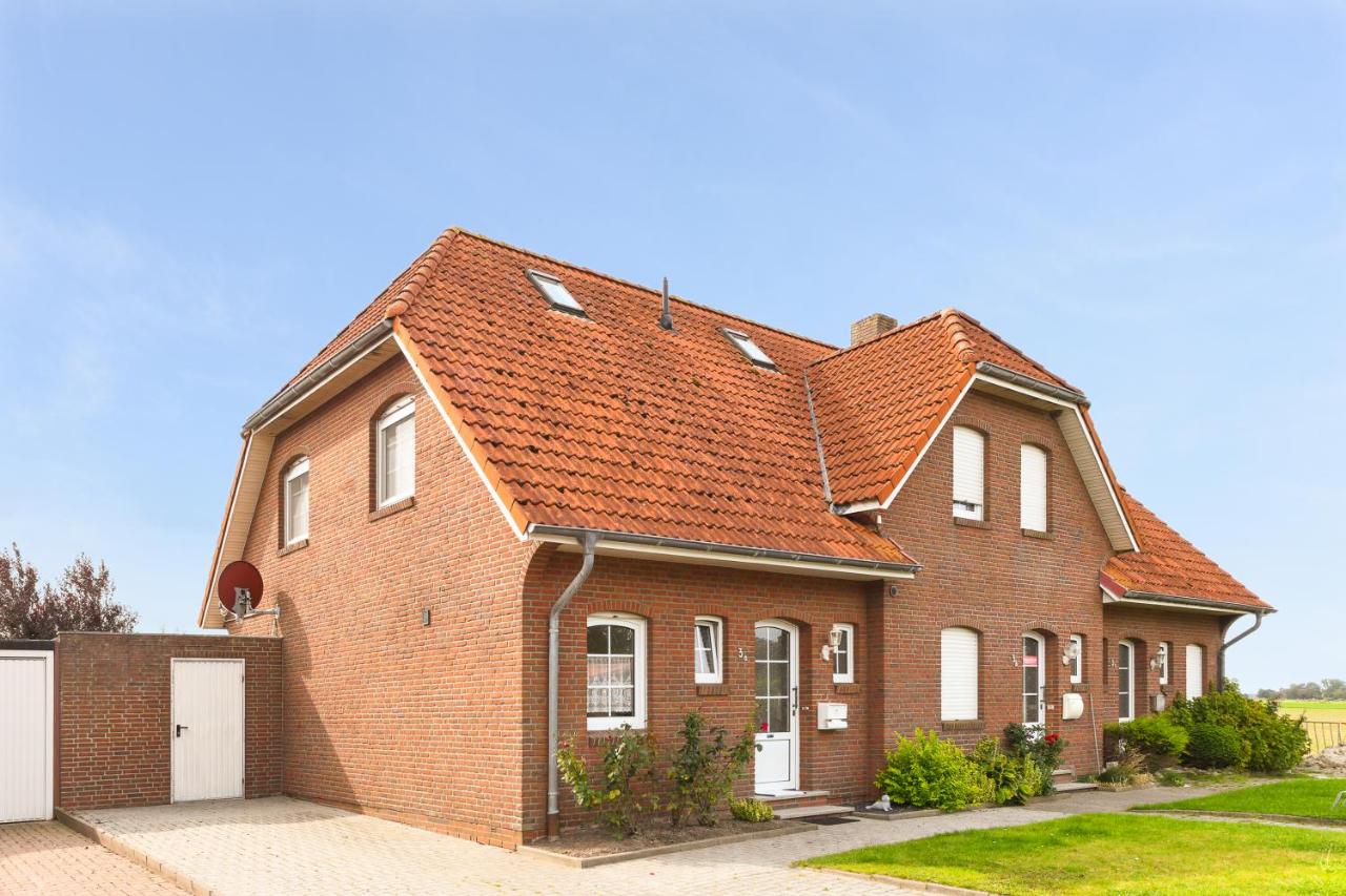 B&B Dornumergrode - Ferienhaus Hosnhuus - Bed and Breakfast Dornumergrode