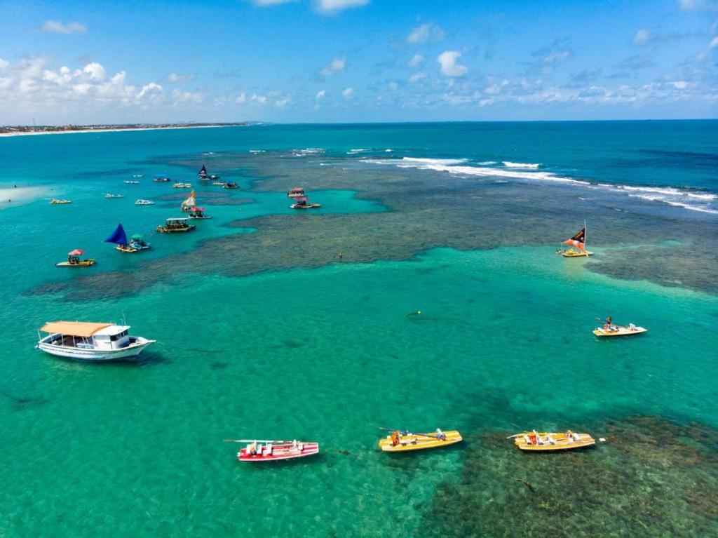 Resort em Porto de Galinhas - Térreo com 03 quartos com suíte top- Condomínio Palm Village Acqua - Chambres d'hôtes Porto de Galinhas