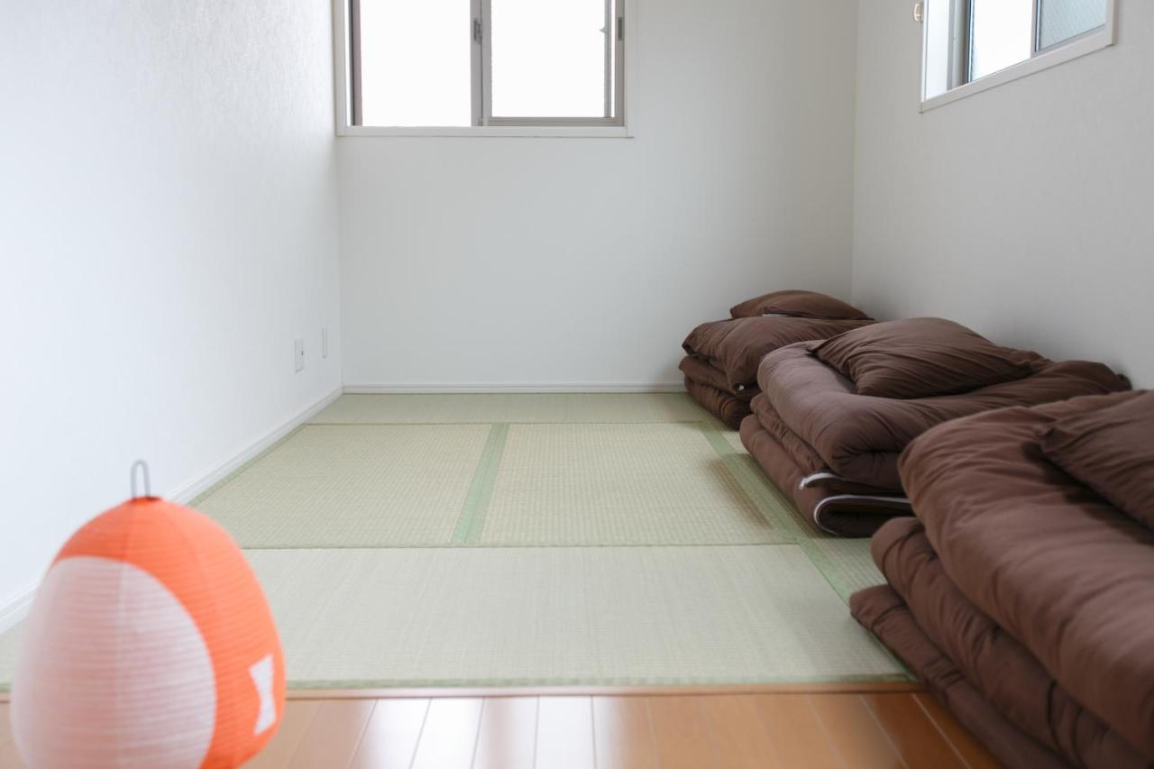 Chambre Triple avec Salle de Bains Commune