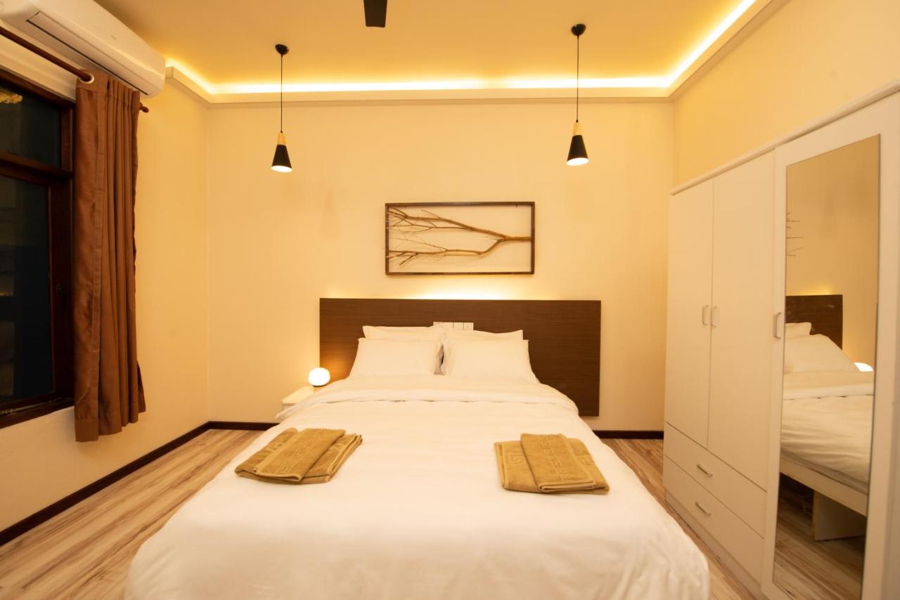 Chambre Lit Queen-Size Deluxe
