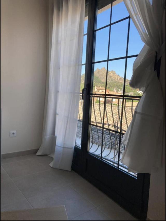 Apartamentos El Piquillo en Cadalso de los Vidrios - Chambres d’hôtes