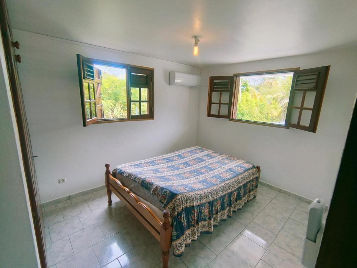 Bas de villa type F2 proche commodités - Chambres d’hôtes