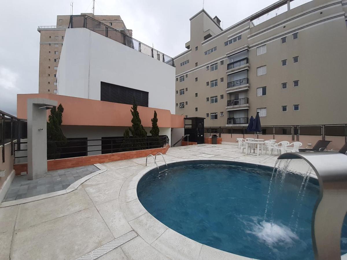 Lindo Flat no Edifício Cosmopolitan, com GARAGEM e PISCINA - B&B Santos