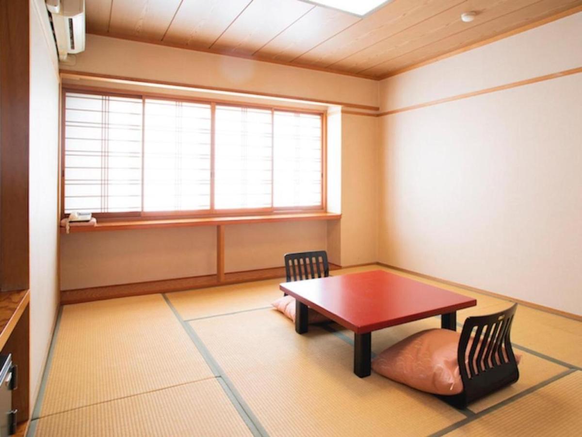 Quadruple Room with Shared Bathroom