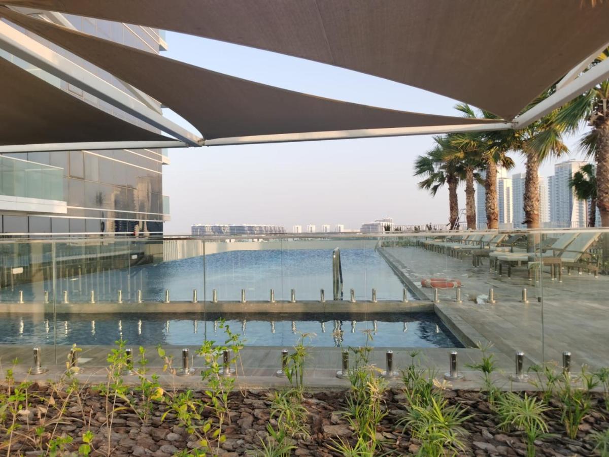 Gharfar-2 Heaven Escape-Golf view-high floor-Netflix-GYM-Pool-perfect staycation - Chambres d'hôtes Dubaï