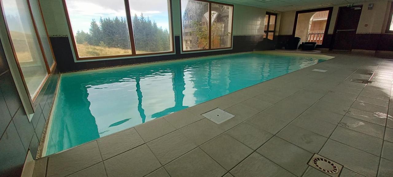 superbesse Appartement 4-6 pers. 2 ch. Dans résidence 3 étoile avec piscine - Chambres d'hôtes Besse-et-Saint-Anastaise