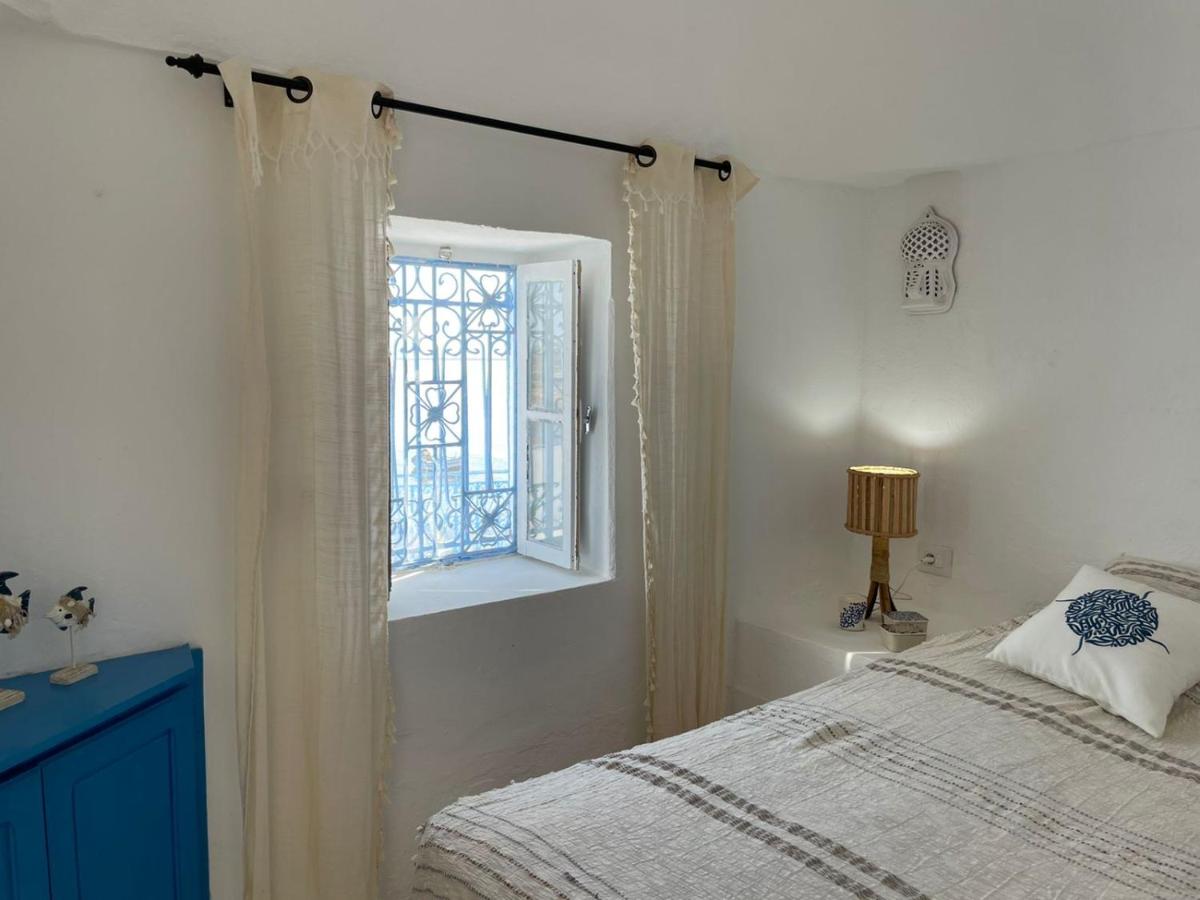 Zimmer mit Queensize-Bett und Meerblick