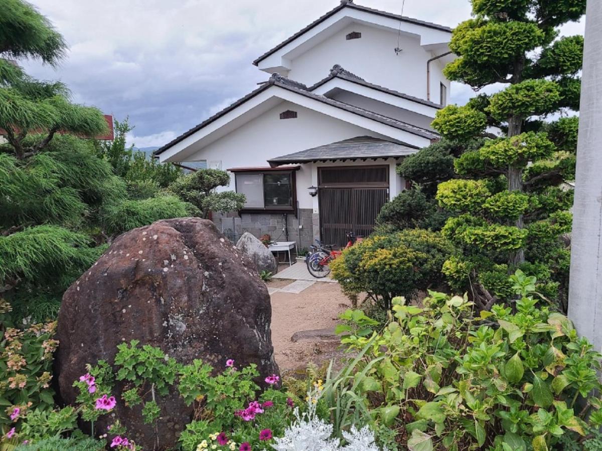 B&B Tōmi - ゲストハウス陽だまりの宿 - Bed and Breakfast Tōmi