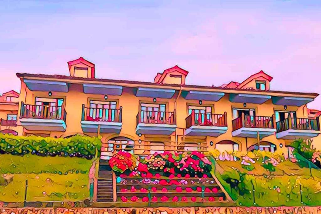 Casa de Las Flores - Apartamento con jardín privado frente a la Playa de Comillas - B&B