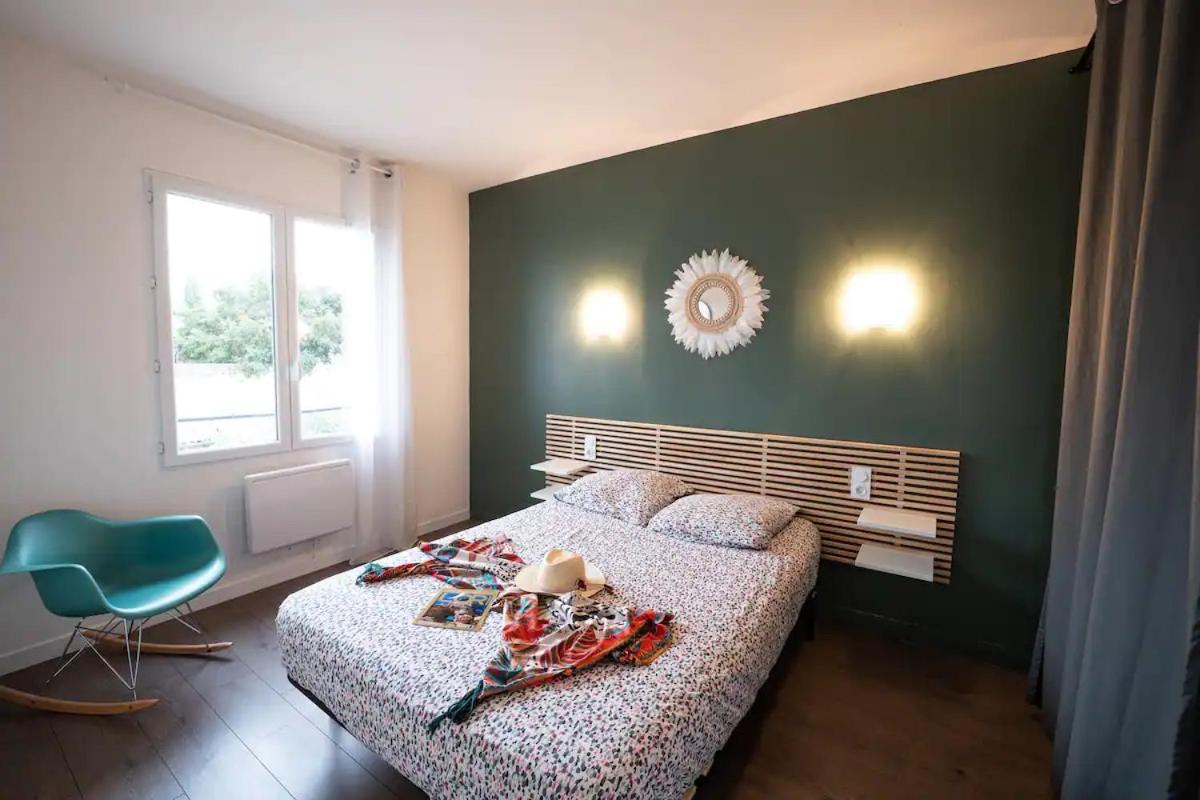 appartement n2 centre village, clim, parking gratuit - B&B