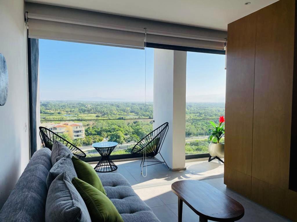 nuevo aria ocean departamento moderno frente al mar - B&B