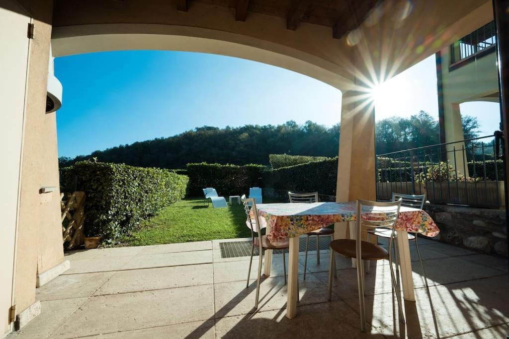 Oliva Apartment - Featuring a Private Garden and Access to a Pool - B&B Barcuzzi
