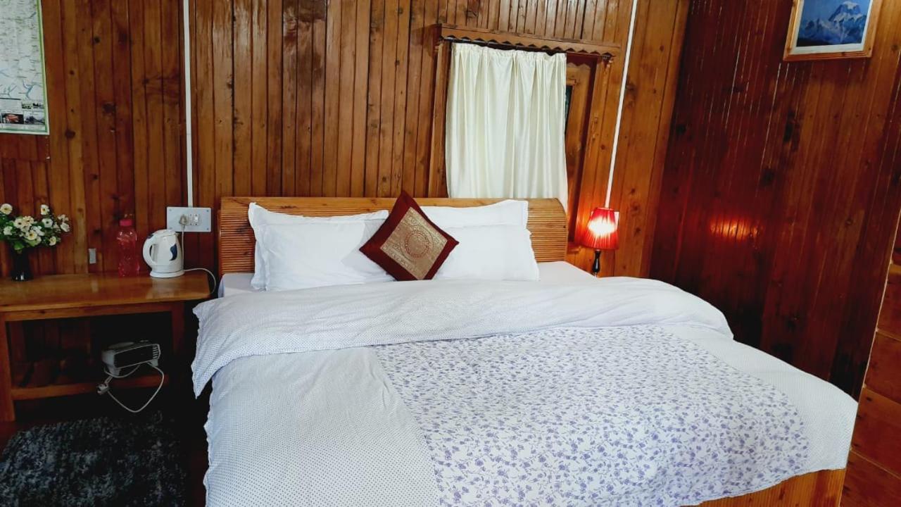 Camera Tripla con Vista Giardino