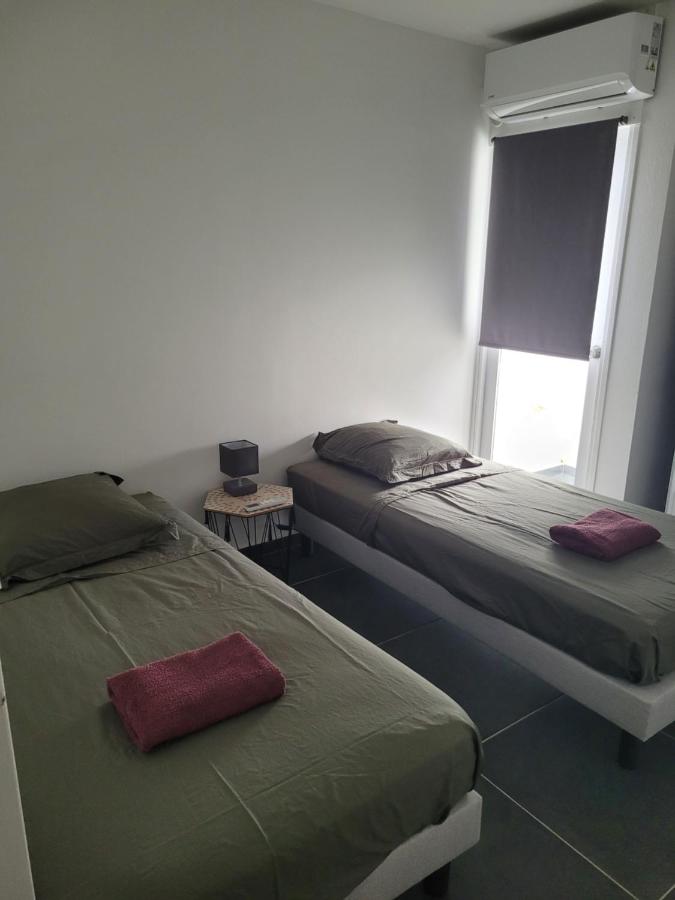 Tweepersoonskamer met 2 Aparte Bedden