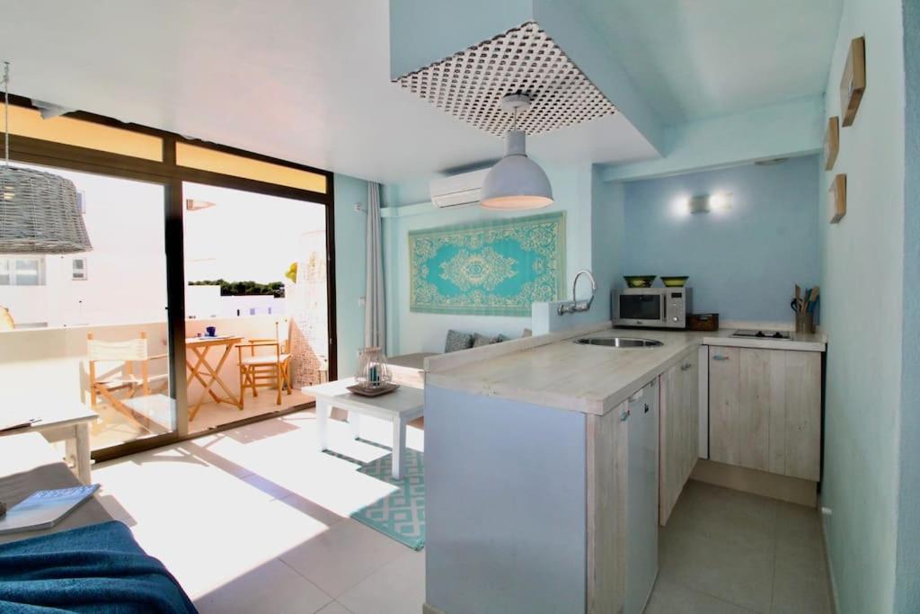 Agradable apartamento con terraza en Formentera - Ferienwohnung Es Pujols
