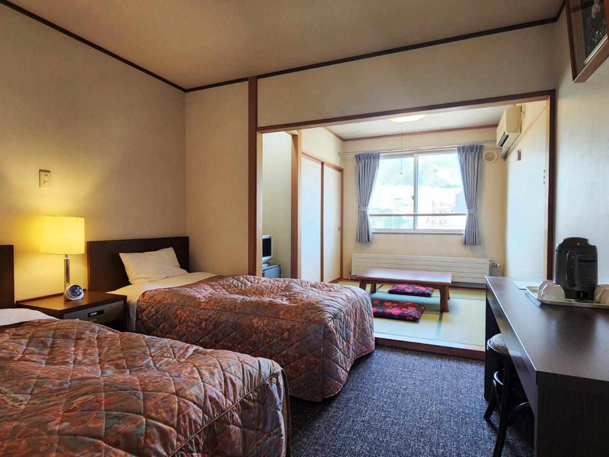 Quadruple Room with Private Bathroom