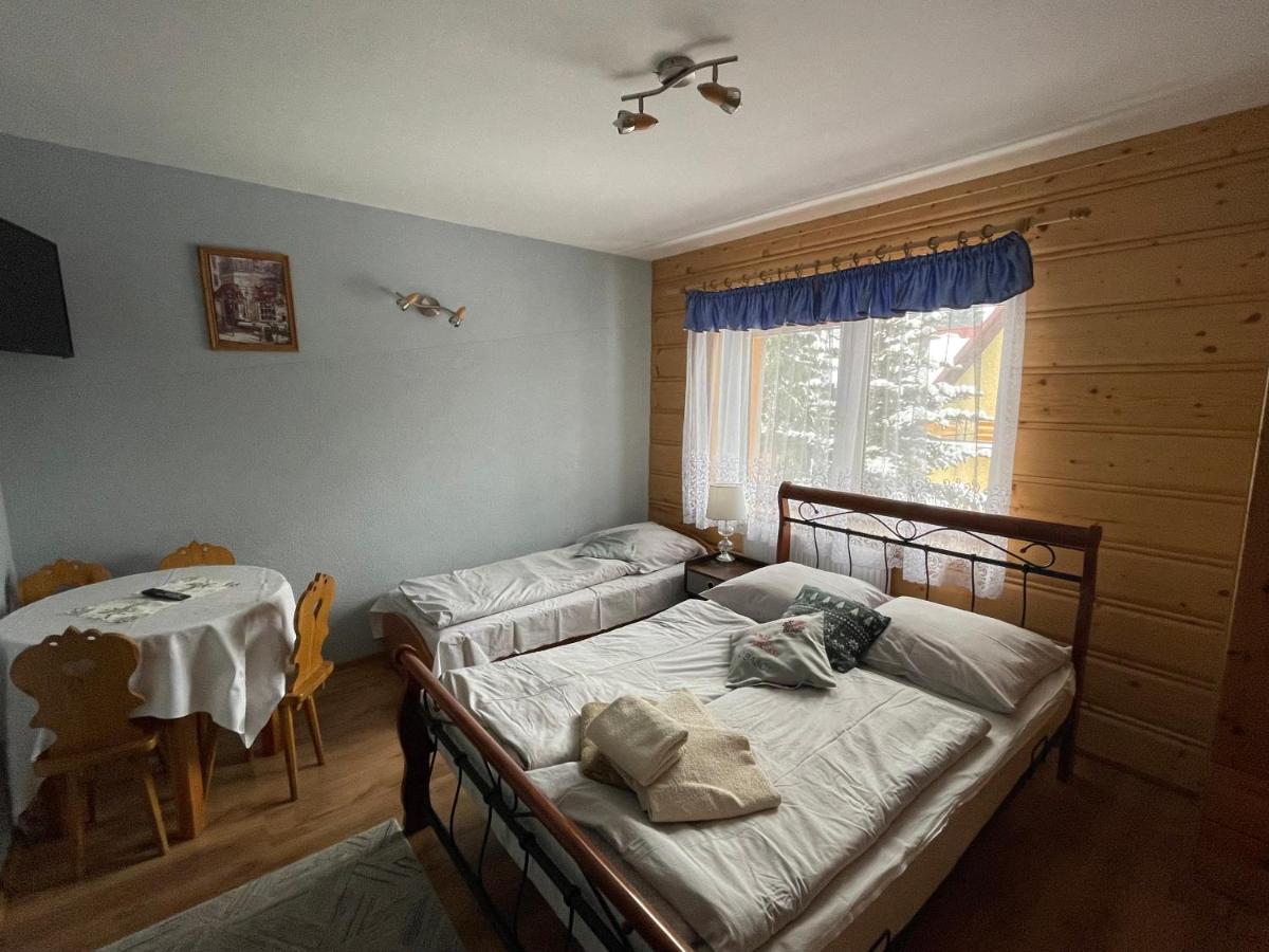 Camera Quadrupla con Letto Matrimoniale