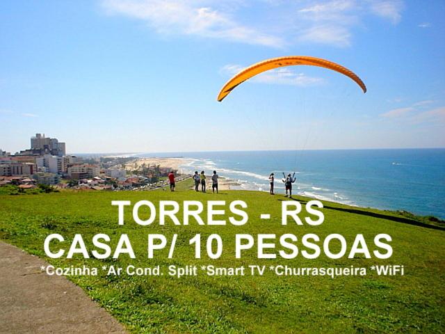 CASA de 2 quartos com 2 ares-condicionados em TORRES-RS - Na mais bela praia Gaúcha - Cozinha - Banheiro - TV smart 32 e Wi-Fi - Estacionamento - Anfitriã Superhost no BnB - B&B