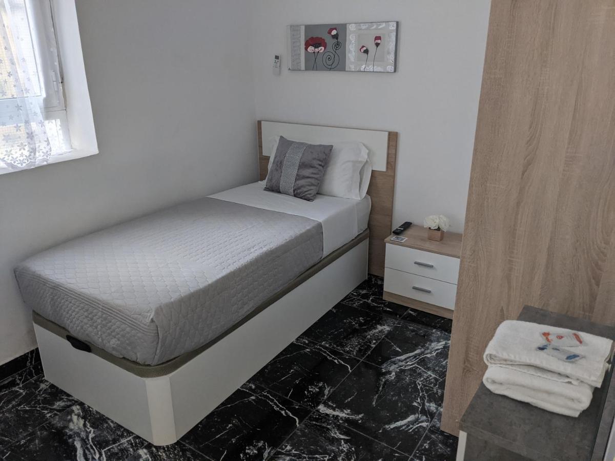 Eenpersoonskamer met Gedeelde Badkamer