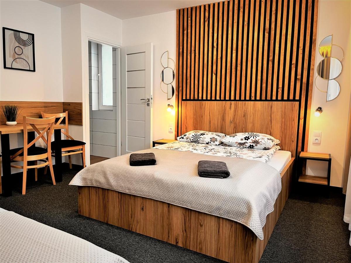 Dreibettzimmer mit eigenem Bad